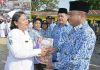 Pimpin Upacara HKN, Wabup Sergai Serahkan SK Bidan PTT