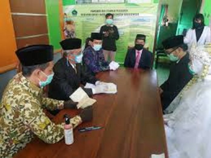 Ilustrasi Ijab Qabul di KUA Gunakan Protokol Kesehatan