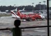 Pandemi Corona, Puluhan Pesawat AirAsia Indonesia Diparkirkan Pesawat AirAsia Diparkiran Bandara Soekarno Hatta